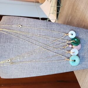 18in crystal donut necklaces on gold tone chain Each Sold Seperately